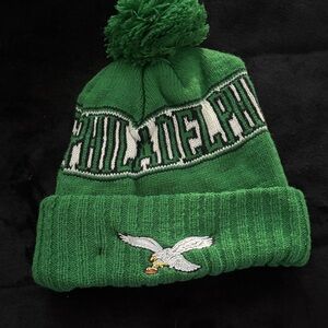 New Era Green Philadelphia throwback Pom Beanie with classic Eagle